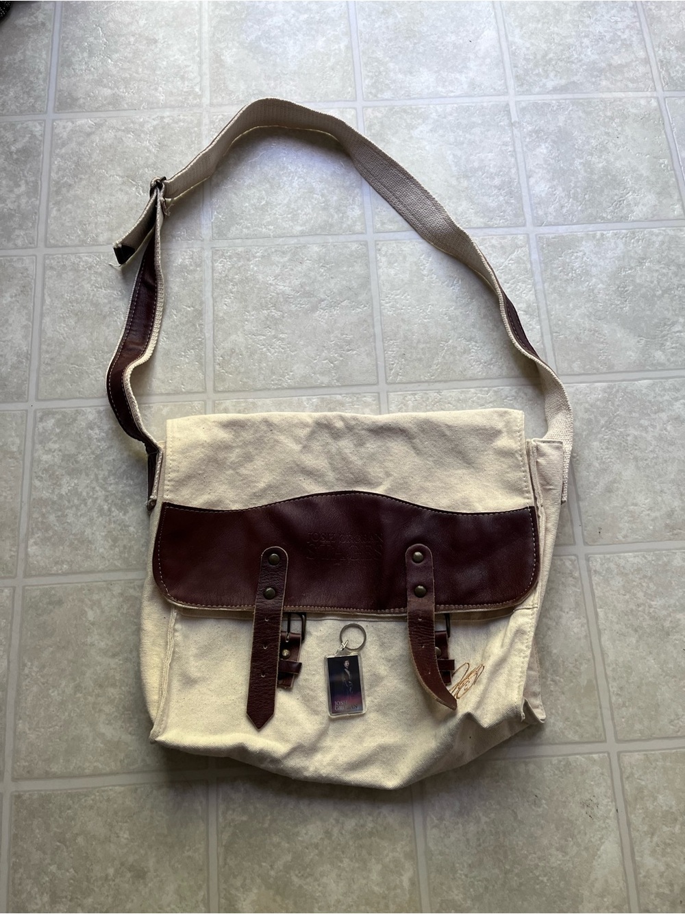 Josh Groban Stages Messenger Bag and Keychain